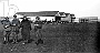 Aviatori della Grande Guerra.  1918.  Mario Martini e Pasquale Liberi sullo sfondo dell'hangar dell'87 Squadrone, a Nord del campo di S. Pelagio. (Oscar Mario Zatta)